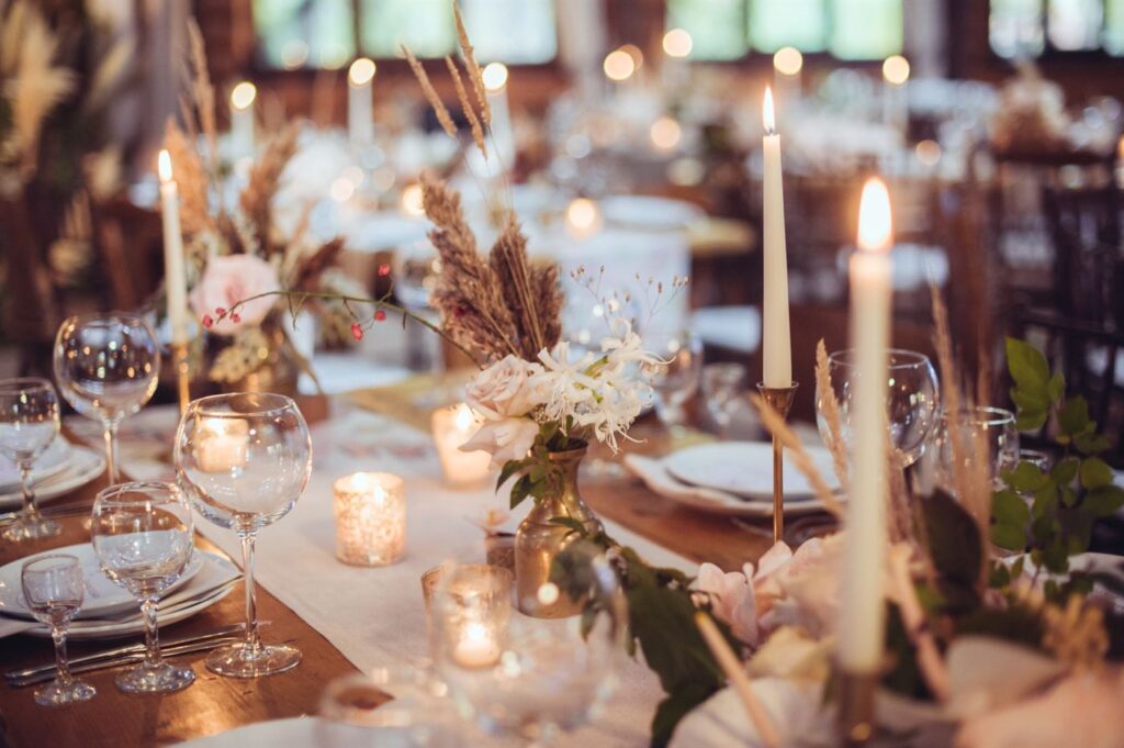 Elegantly set banquet tables at <a href=